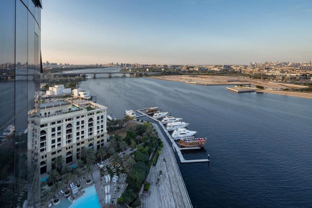 an aerial view of a river with boats docked at Frank Porter - D1 Jaddaf in Dubai