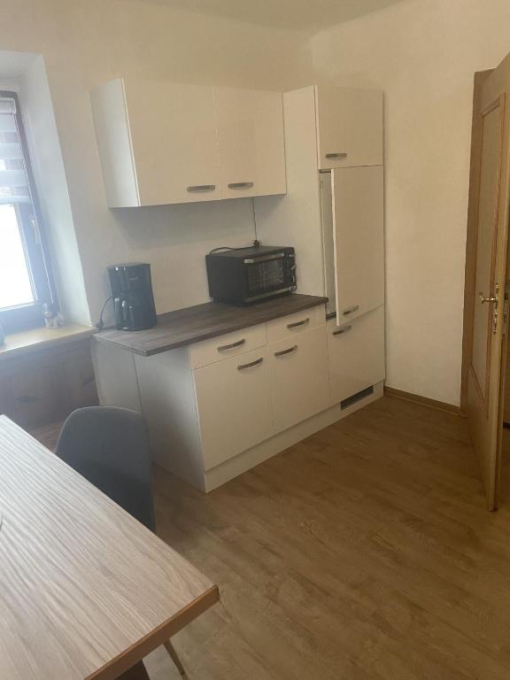 Kuchyň nebo kuchyňský kout v ubytování Ute Urbaner