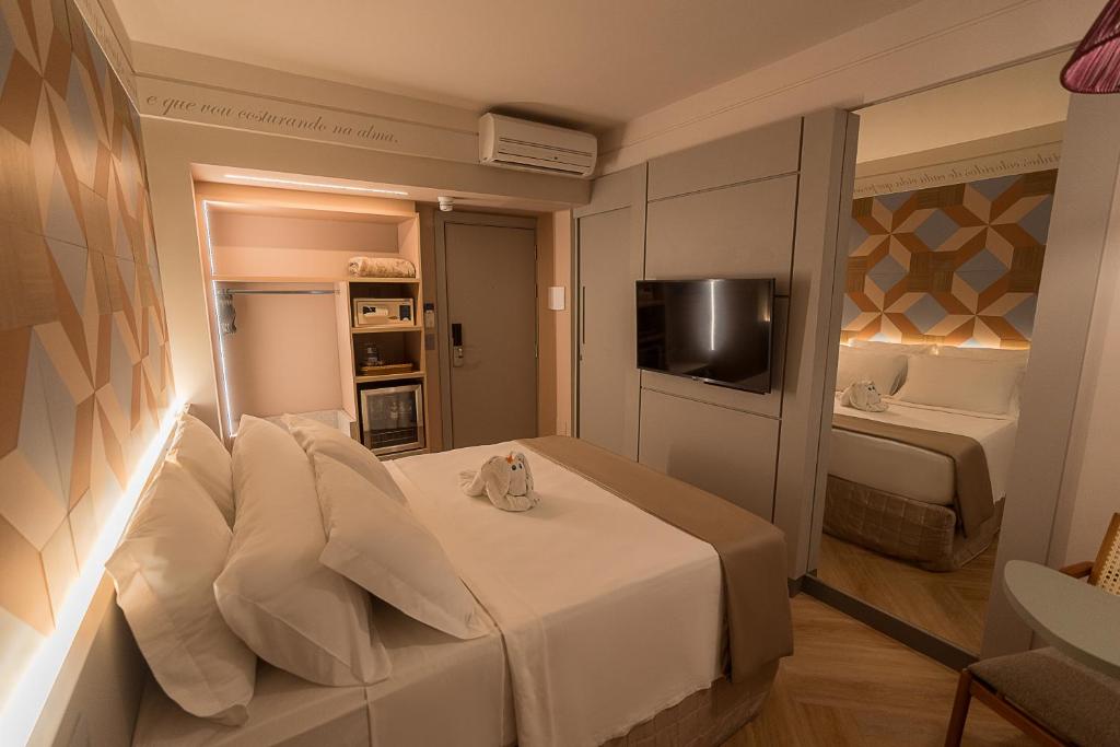Postel nebo postele na pokoji v ubytování Rio Quente Resorts - Hotel Pousada