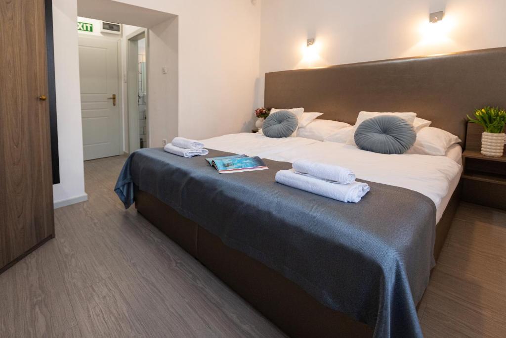 Posteľ alebo postele v izbe v ubytovaní Csillag Villa