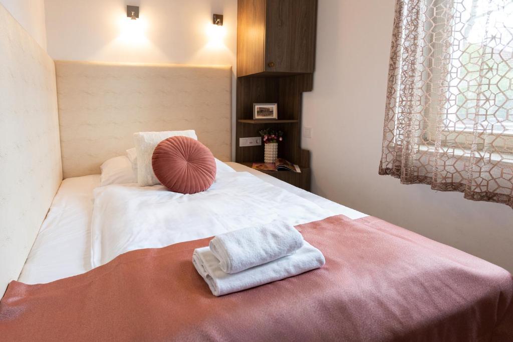 Posteľ alebo postele v izbe v ubytovaní Csillag Villa