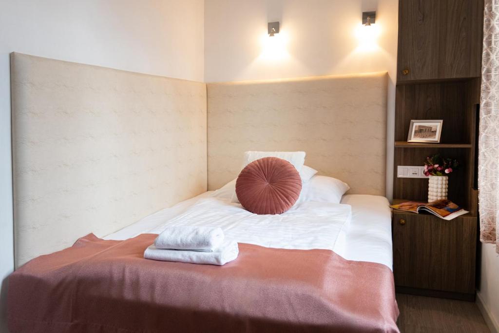 Posteľ alebo postele v izbe v ubytovaní Csillag Villa