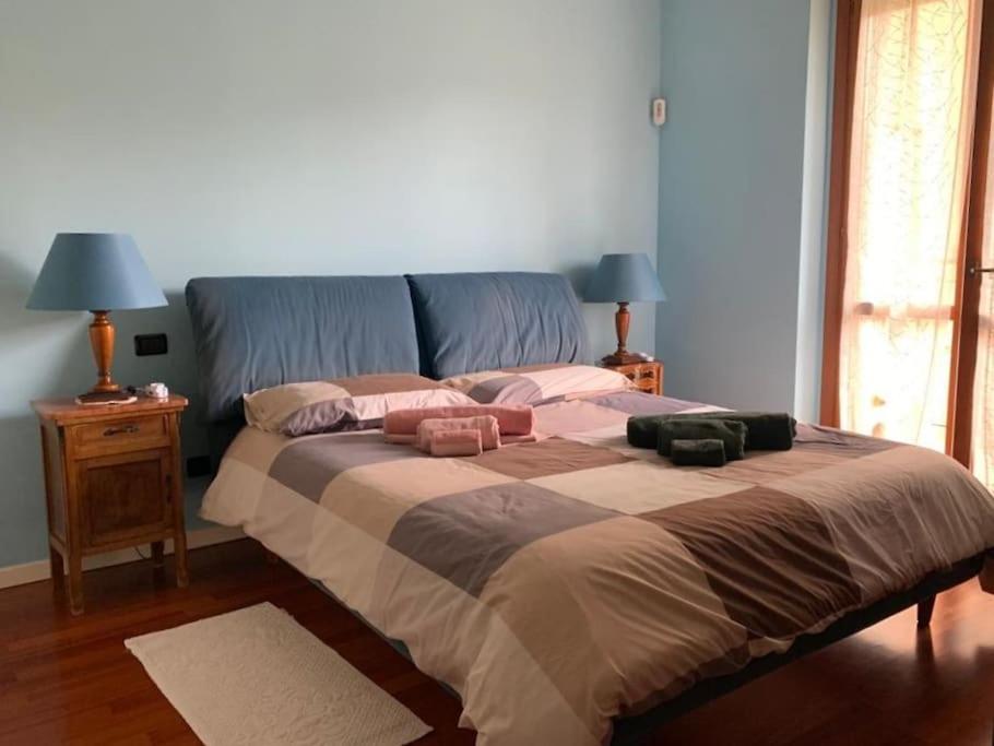 Posteľ alebo postele v izbe v ubytovaní La casa del Parco di San Donato Milanese