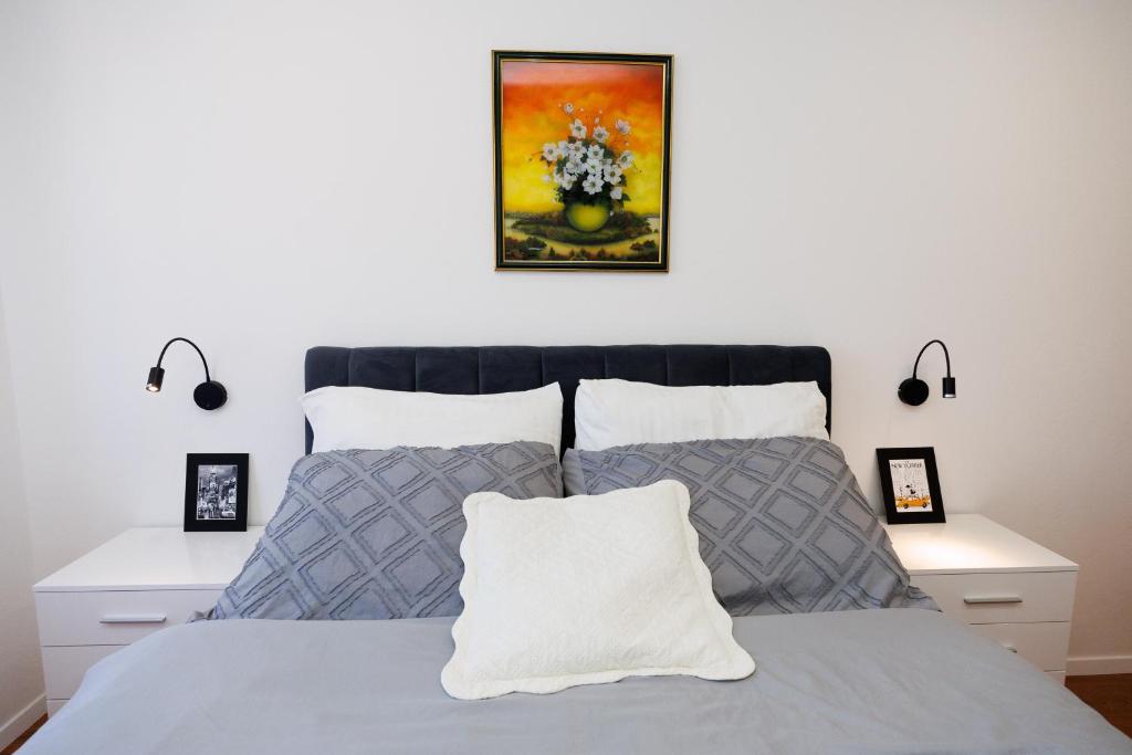 Łóżko lub łóżka w pokoju w obiekcie Apartment Nikoleto