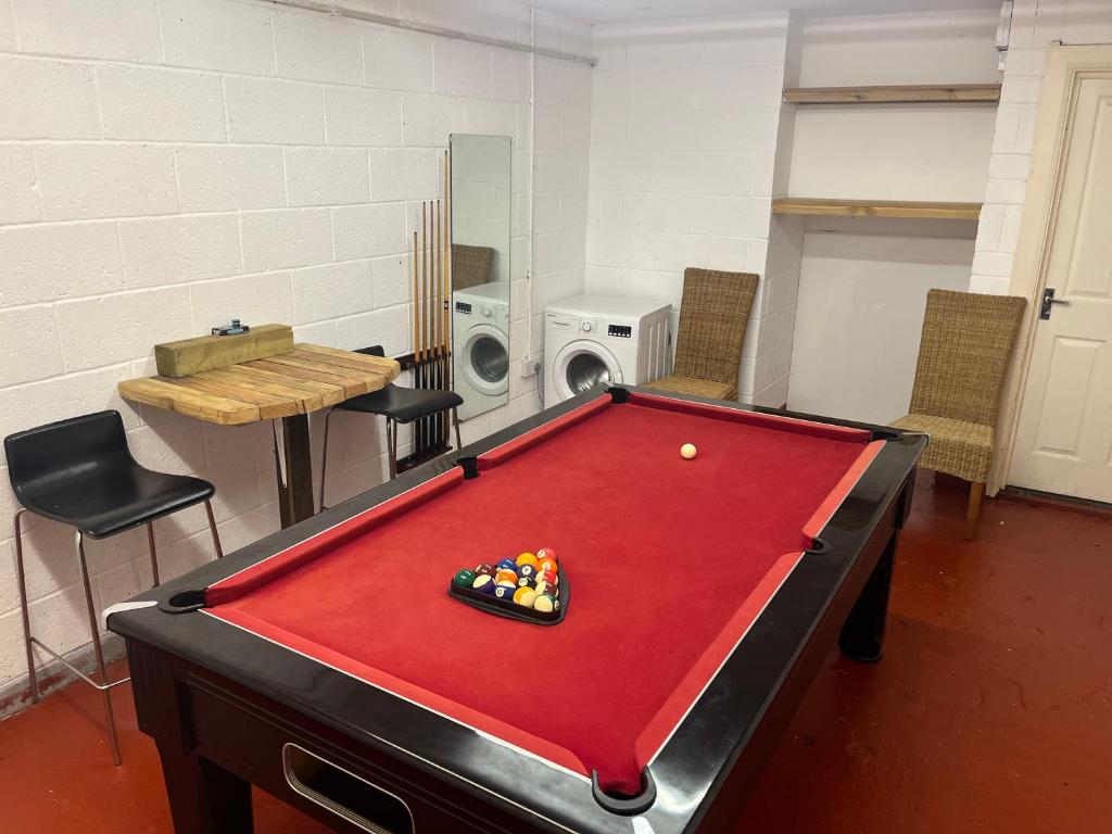 a pool table in a room with a ping pong ball at COSY 3 - City View in Sunderland