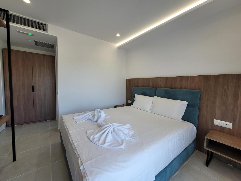 Postel nebo postele na pokoji v ubytování Prestige Hotel