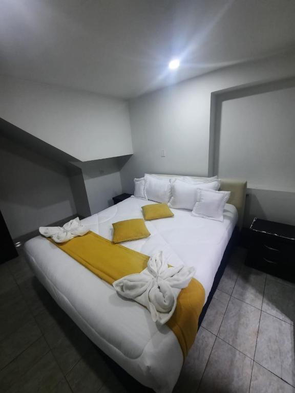 Postel nebo postele na pokoji v ubytování Hotel Zafiro Boutique