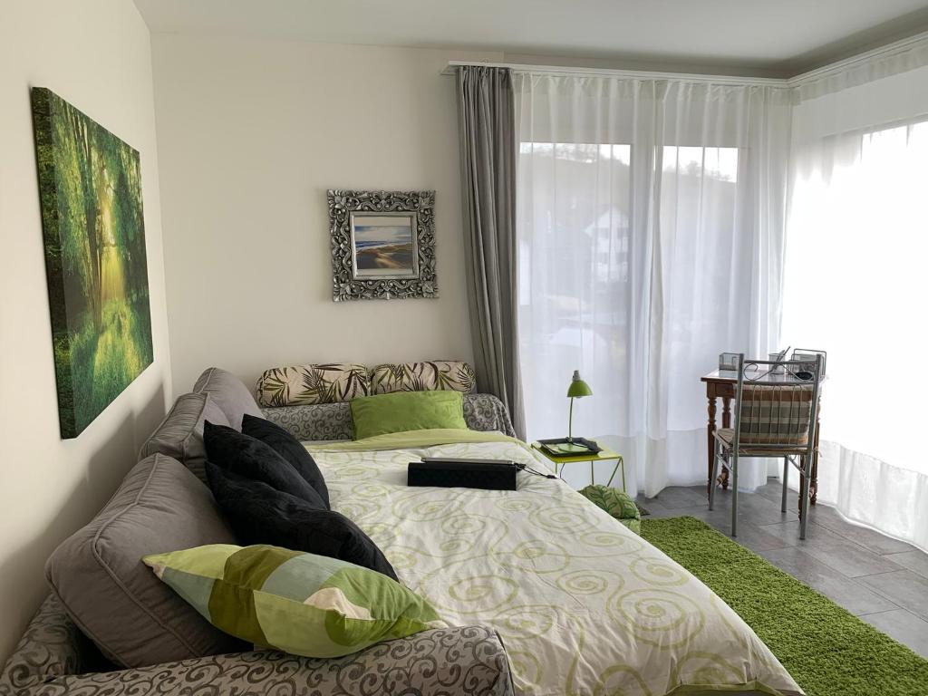 Postel nebo postele na pokoji v ubytování Chez Svanette B&B Villa Sonnglück