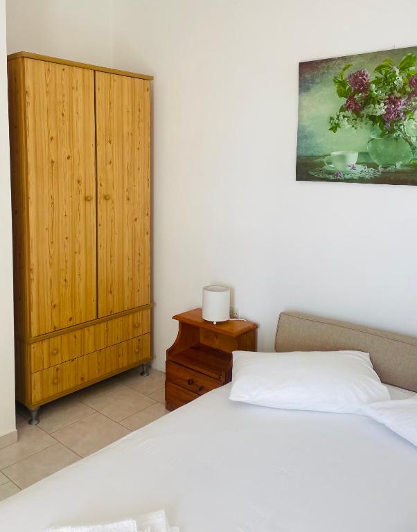 Postel nebo postele na pokoji v ubytování Tasos Manaritsas Rooms