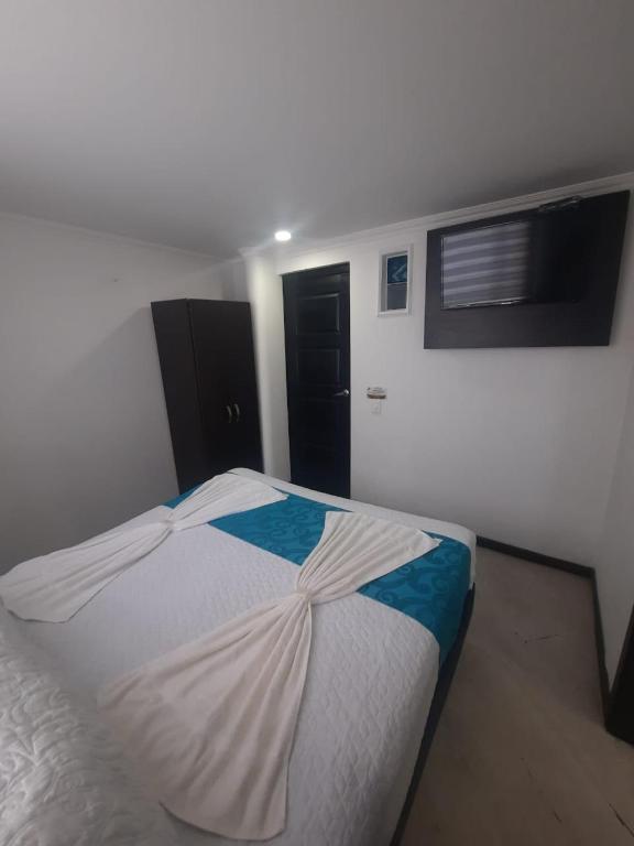 Postel nebo postele na pokoji v ubytování Hotel Zafiro Boutique