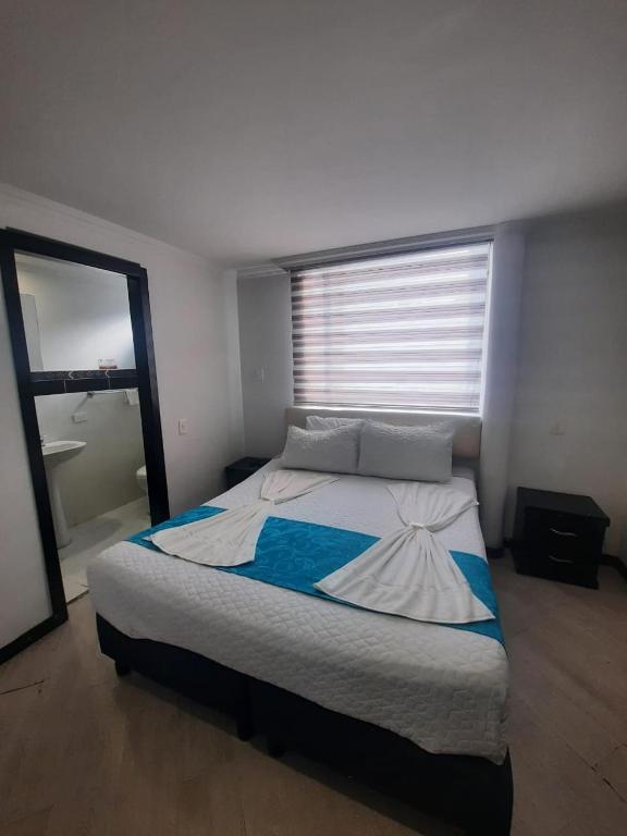 Postel nebo postele na pokoji v ubytování Hotel Zafiro Boutique