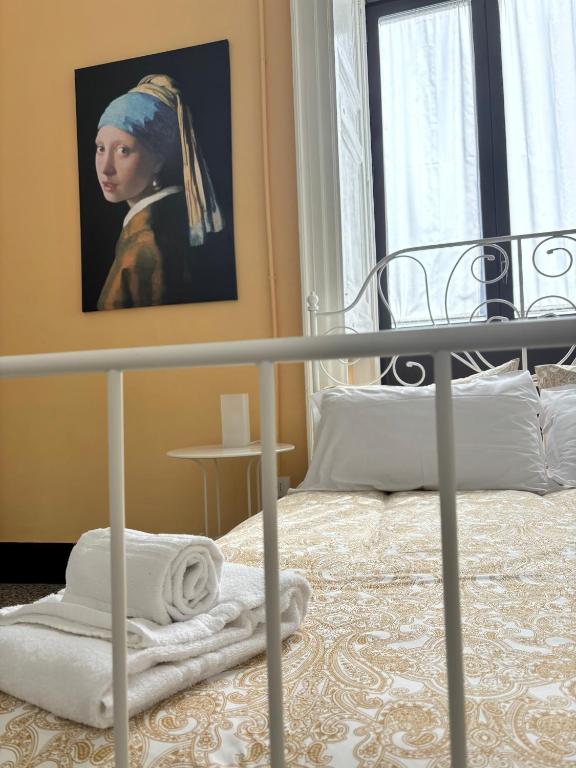 Posteľ alebo postele v izbe v ubytovaní Il Teatro Rooms