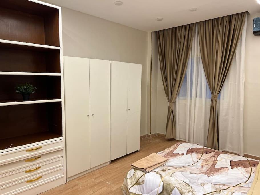 Postel nebo postele na pokoji v ubytování Urban Elegance @ Maadino6