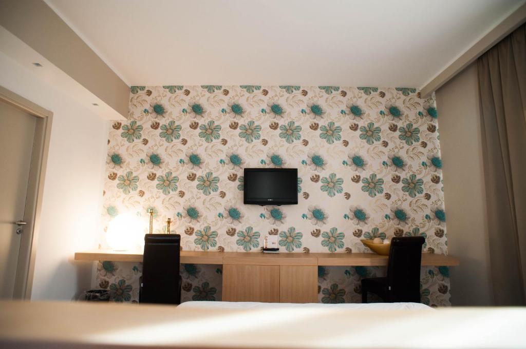 TV a/nebo společenská místnost v ubytování FerroHotel