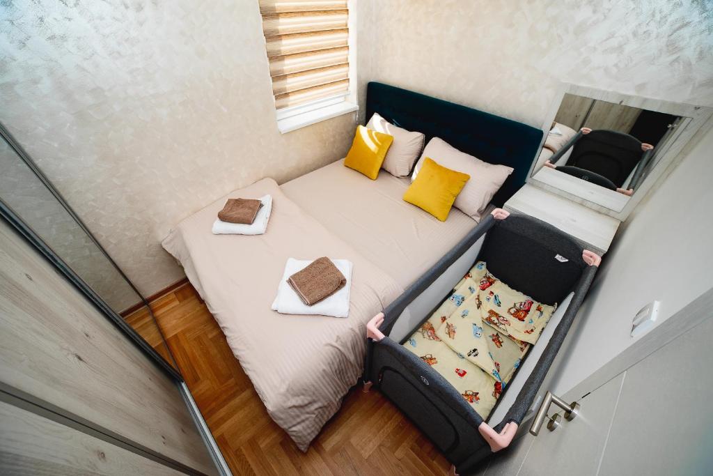 Postel nebo postele na pokoji v ubytování Apartman VELUK