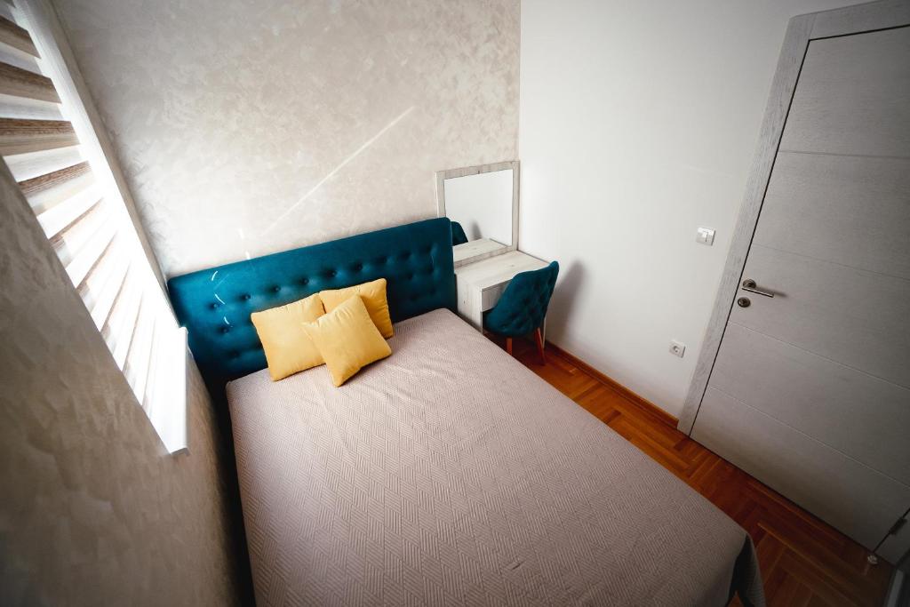 Postel nebo postele na pokoji v ubytování Apartman VELUK