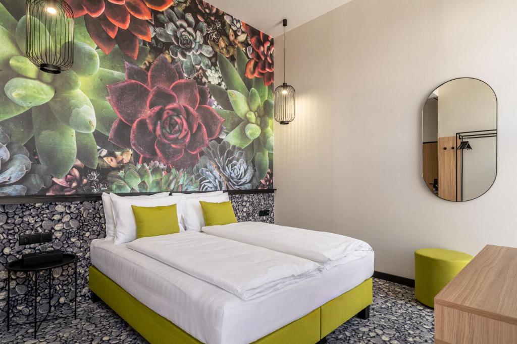 Postel nebo postele na pokoji v ubytování URBAN HOTEL