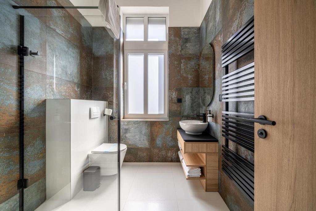 Koupelna v ubytování URBAN HOTEL