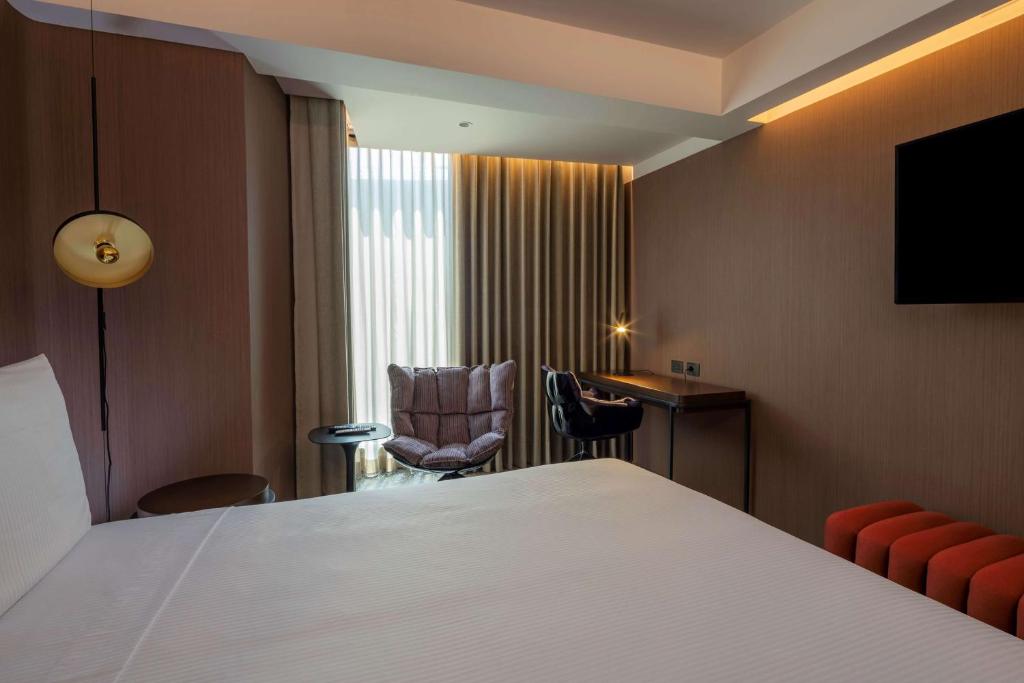 Voodi või voodid majutusasutuse Doubletree By Hilton Lima San Isidro toas