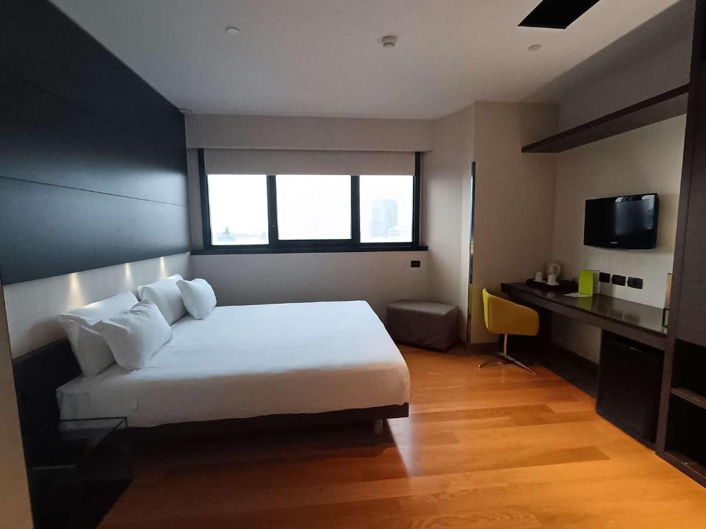 Postel nebo postele na pokoji v ubytování Best Western Plus The Hub Hotel