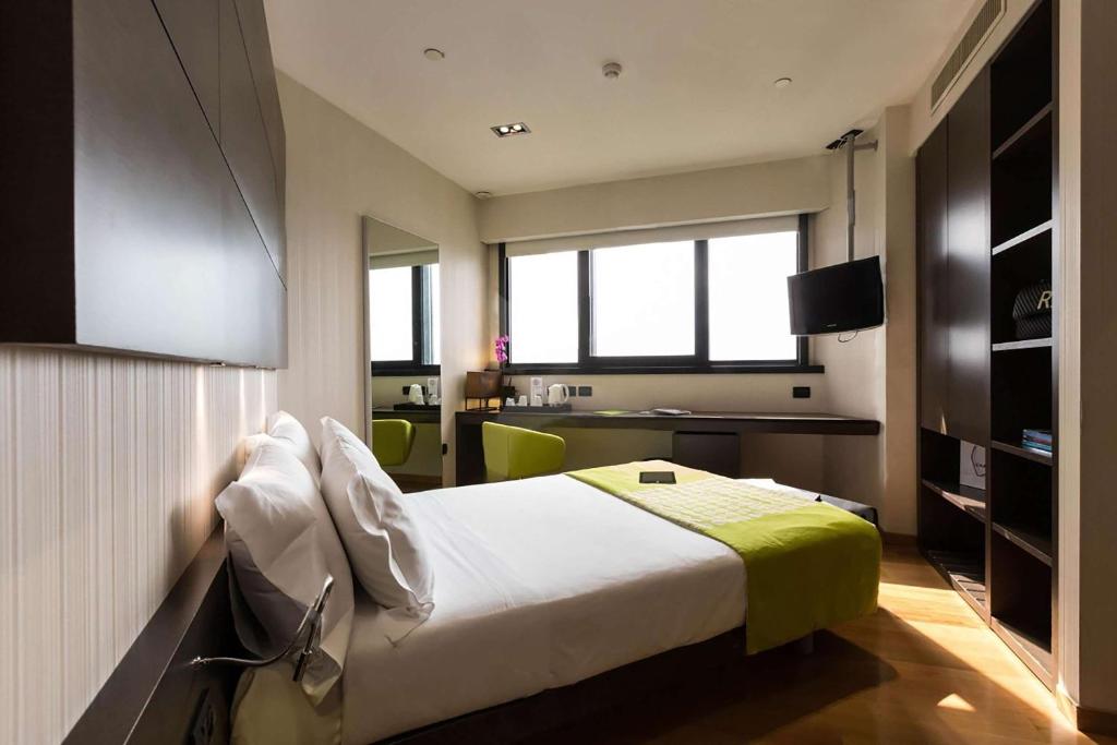 Postel nebo postele na pokoji v ubytování Best Western Plus The Hub Hotel