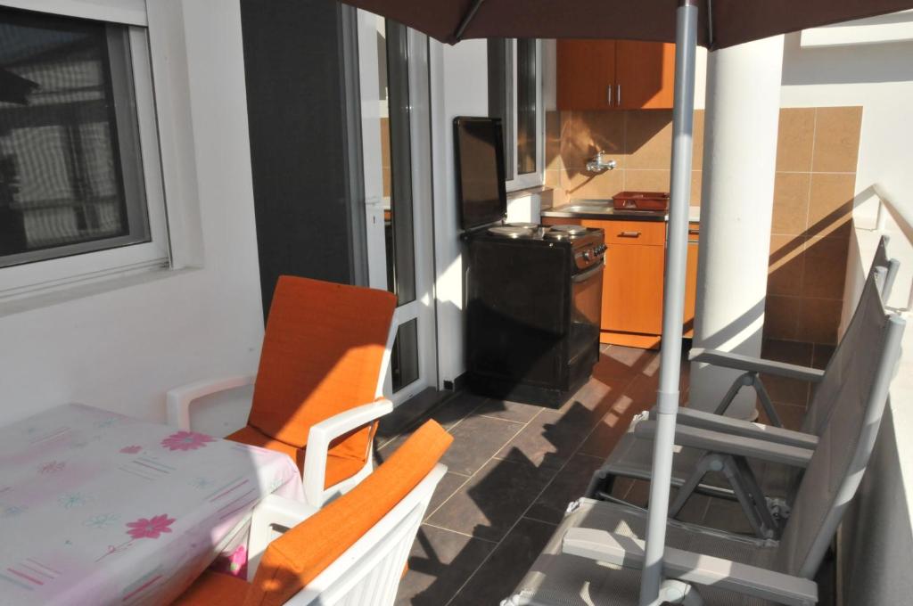 Posezení v ubytování Guest House Nura