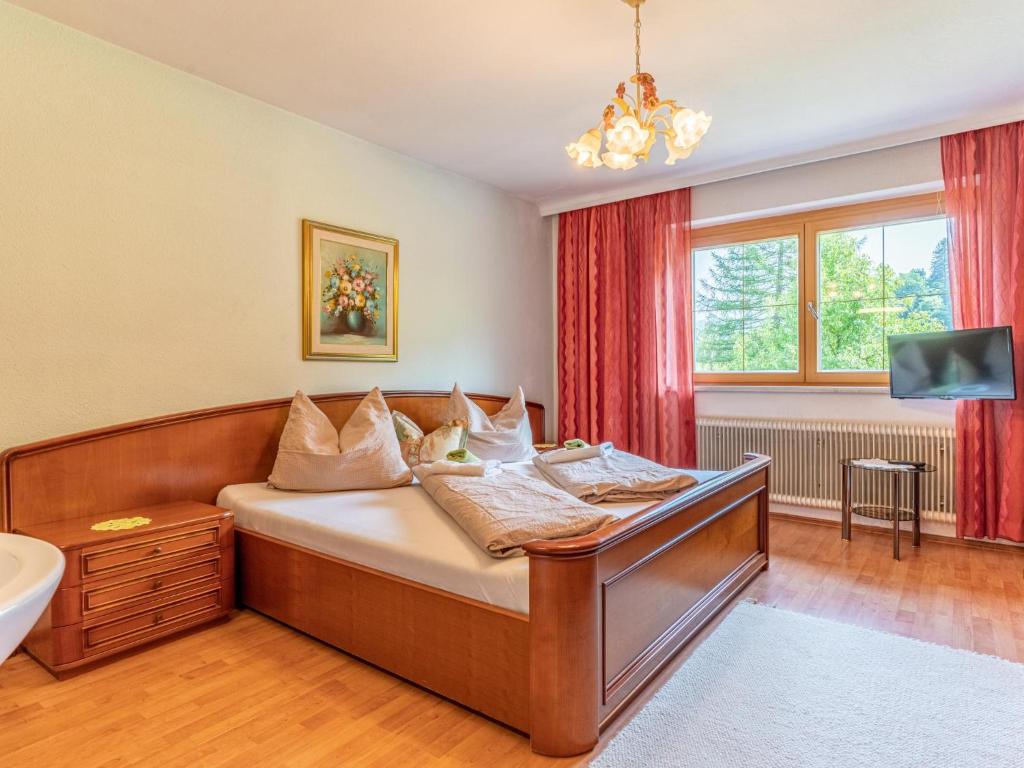 Televízia a/alebo spoločenská miestnosť v ubytovaní Hintermühltalhof