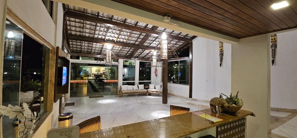TV a/nebo společenská místnost v ubytování Porto Bali Hotel