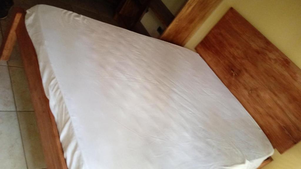 Postel nebo postele na pokoji v ubytování Cabinas surf Arribadas