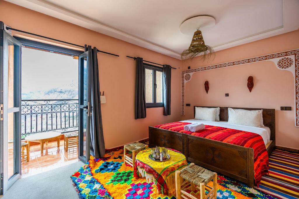 Uma cama ou camas num quarto em Le Reflet D'Imlil