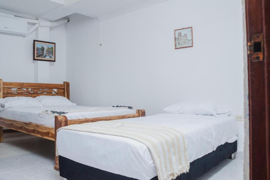 Cama o camas de una habitación en HOSTAL CASA TIO POLI