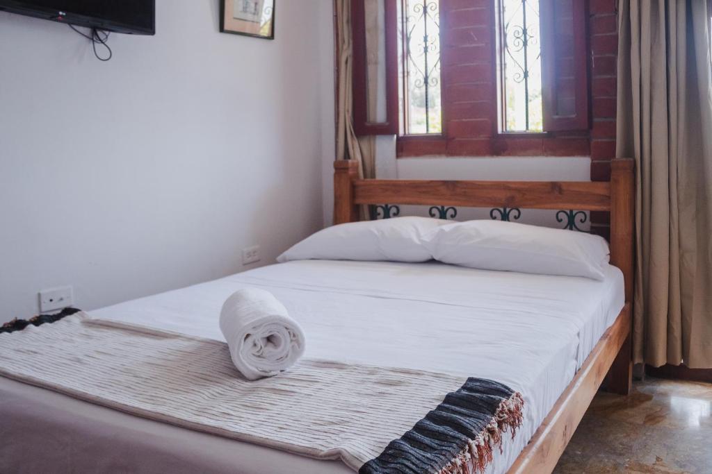 Cama o camas de una habitación en HOSTAL CASA TIO POLI
