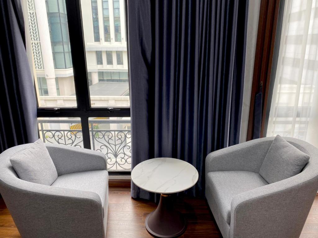 Posezení v ubytování Nguyễn Quyền Hotel