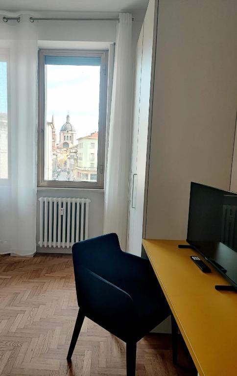 TV a/nebo společenská místnost v ubytování Foresteria Juvarra