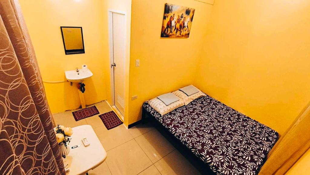 Postel nebo postele na pokoji v ubytování CheRi Backpackers Hostel