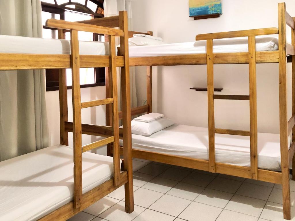 Postel nebo postele na pokoji v ubytování Odoyá Casa Hostel