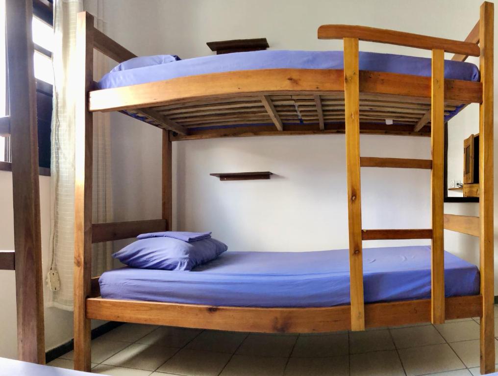 Postel nebo postele na pokoji v ubytování Odoyá Casa Hostel