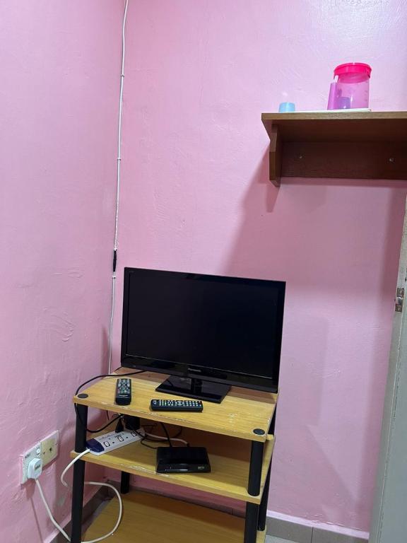 TV a/nebo společenská místnost v ubytování Hotel Cahaya