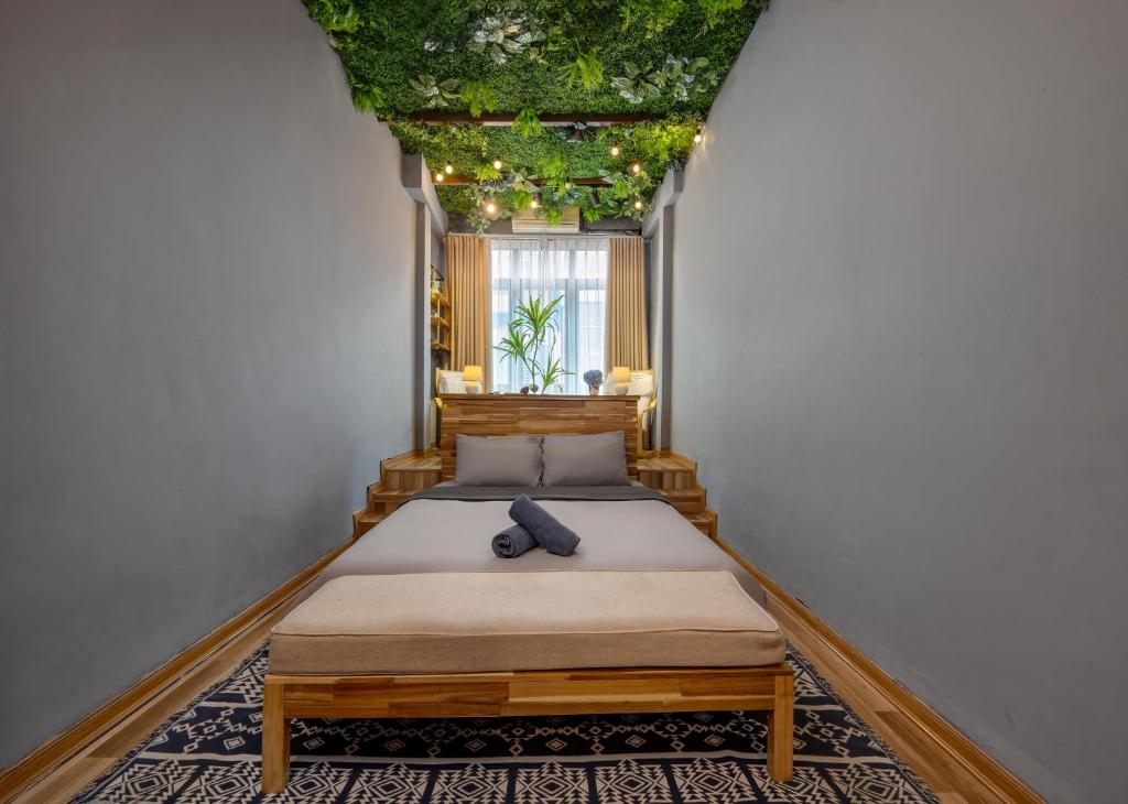 Postel nebo postele na pokoji v ubytování Trinh's House - Hang Vai