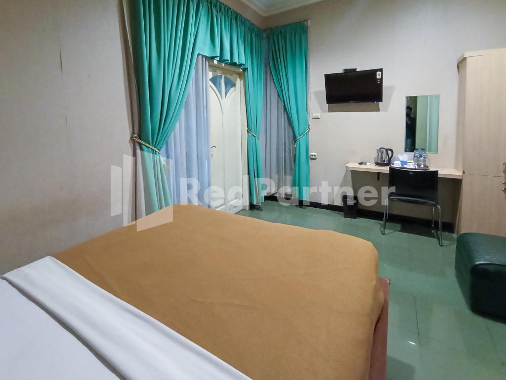 Nillo Hotel Kebumen Mitra RedDoorz - Chambre De Luxe