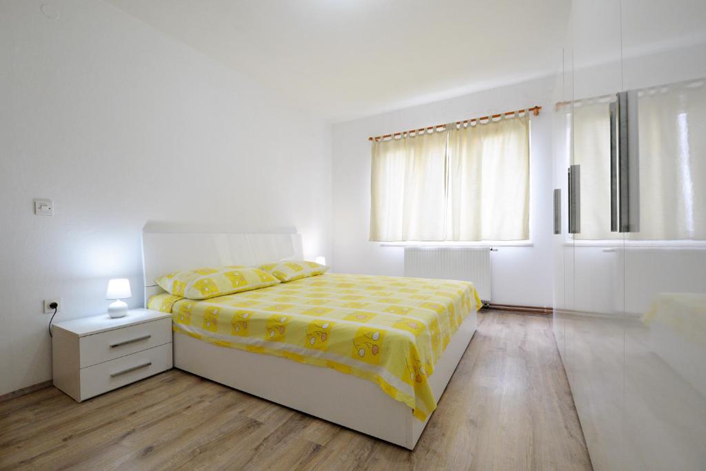 Posteľ alebo postele v izbe v ubytovaní Apartments Goranka 2