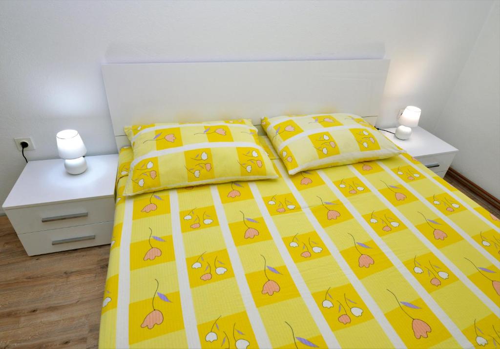 Posteľ alebo postele v izbe v ubytovaní Apartments Goranka 2