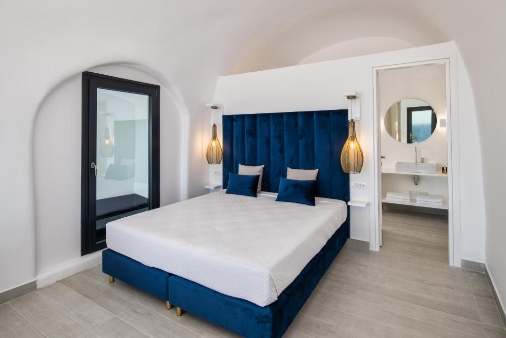 Postel nebo postele na pokoji v ubytování Palm Island Suites