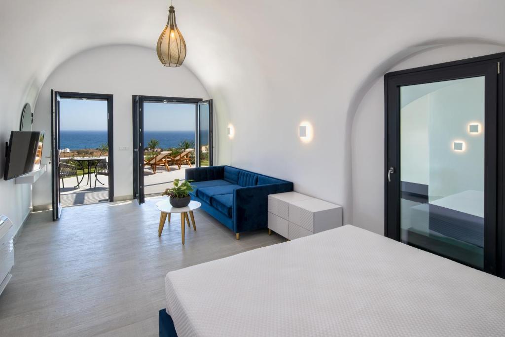 Postel nebo postele na pokoji v ubytování Palm Island Suites
