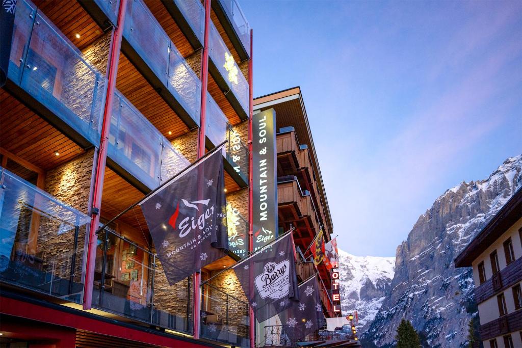 a building with a view of a mountain at Eiger Mountain & Soul Resort in Grindelwald