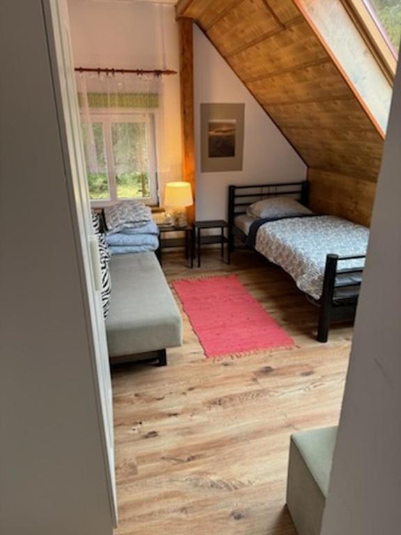 Postel nebo postele na pokoji v ubytování ZACISZE