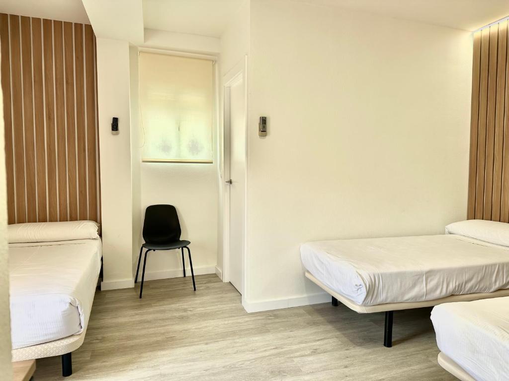 Postel nebo postele na pokoji v ubytování Hotel Victoria Centro