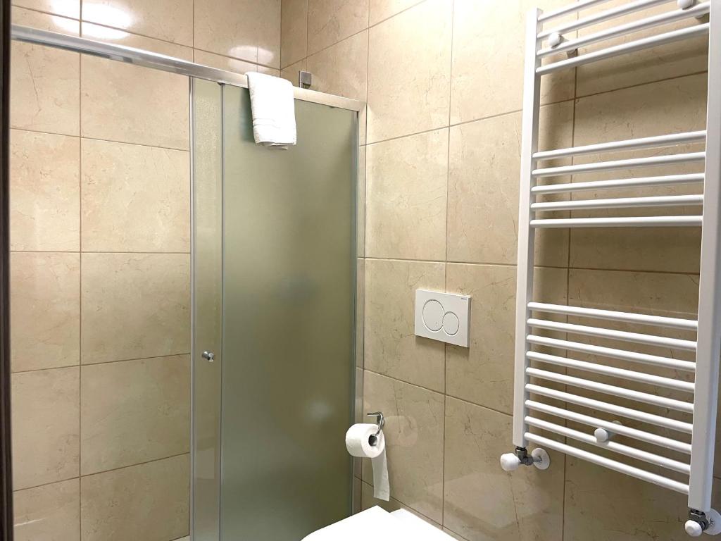Koupelna v ubytování FIERA ROOMS