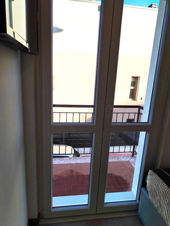 Balkón nebo terasa v ubytování FIERA ROOMS