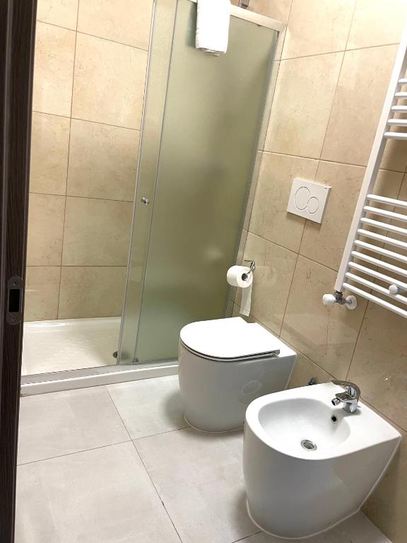 Koupelna v ubytování FIERA ROOMS